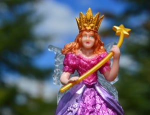 fairy in purple and pink dress holding wand with crown thumbnail