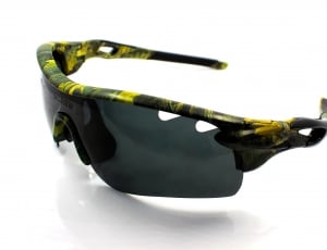 green and yellow sports sunglases thumbnail