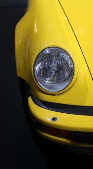 yellow porsche 930 headlamp thumbnail