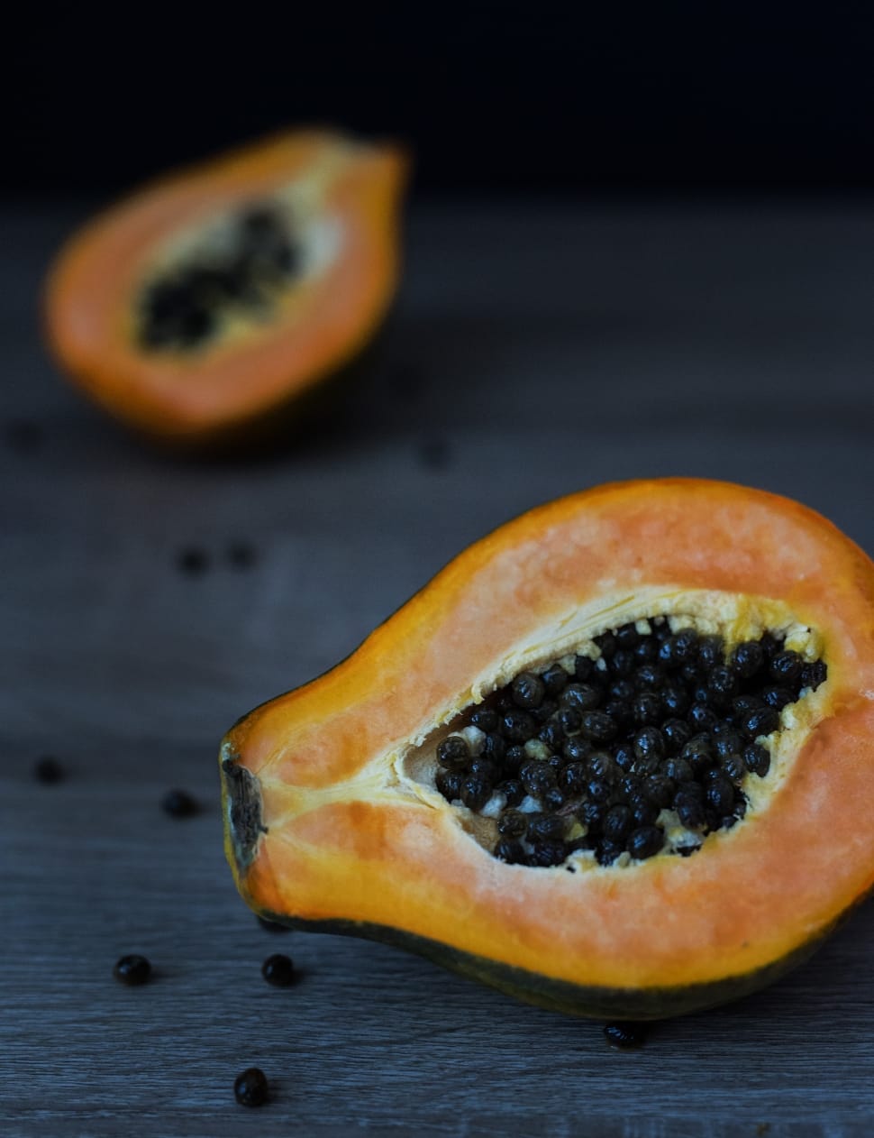 tilt photography of slice papaya fruit preview
