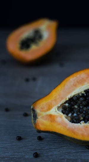 tilt photography of slice papaya fruit thumbnail