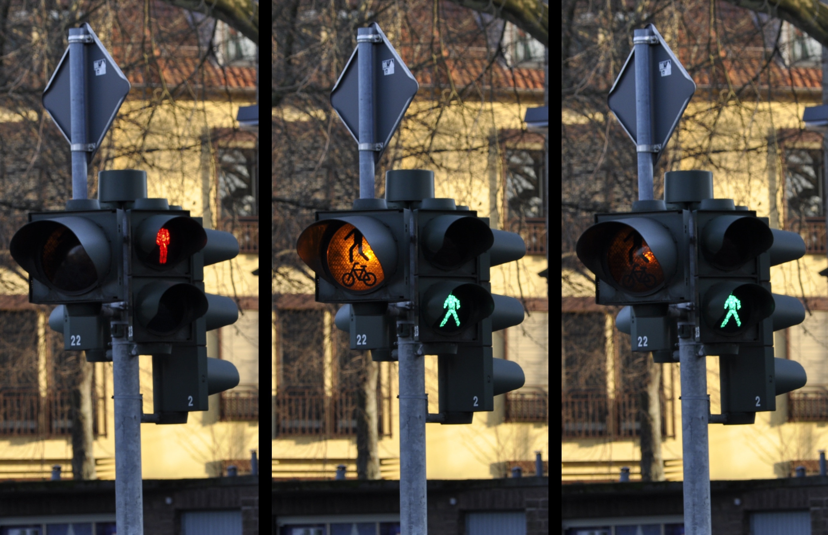 three traffic lights and stop, and pedestrian crossing during daytime