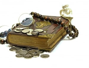 coin hippie eyeglasses necklace and book thumbnail