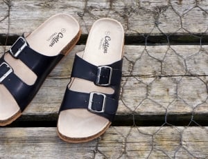 pair of black-and-white sandals thumbnail