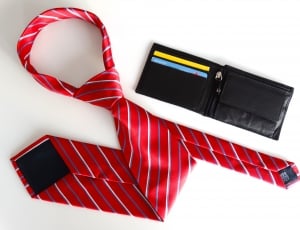 red white and purple stripe necktie and black leather bifold wallet thumbnail