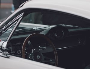 empty white car with a down window thumbnail