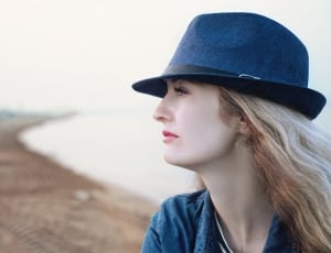 women's blue fedora hat and blue denim shirt thumbnail