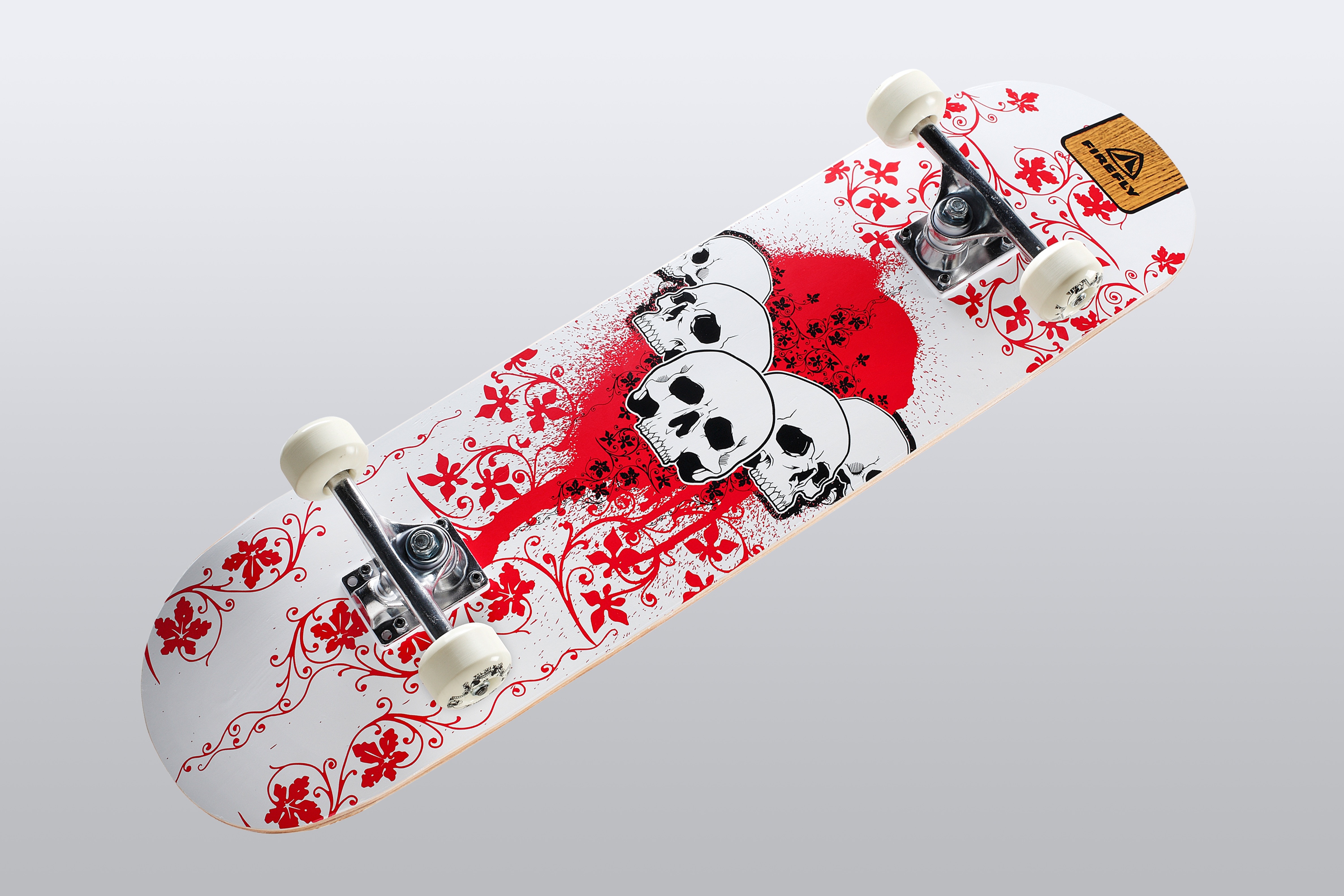 white black and skull print skateboard