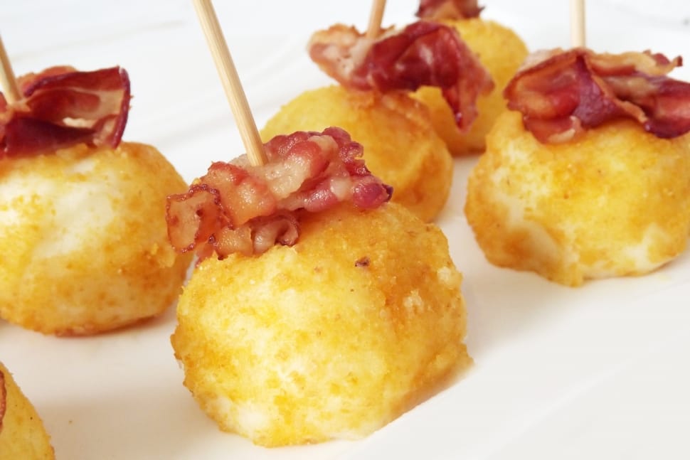 six deep fried squid balls with bacon topping with toothpick preview