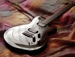 black stratocaster electric guitar thumbnail