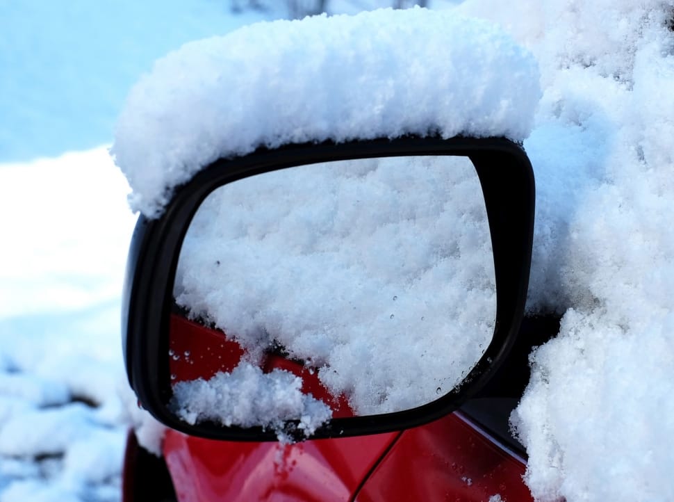red Car's Side mirror with snow preview