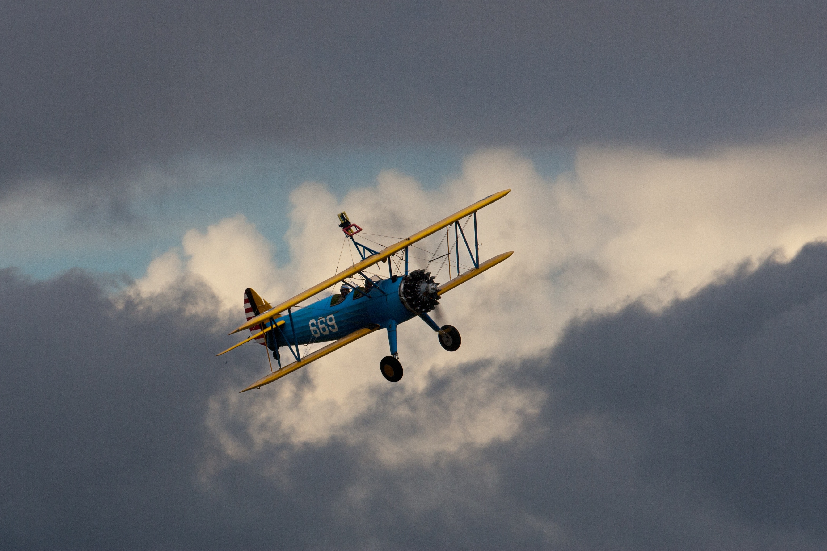 blue and yellow aircraft