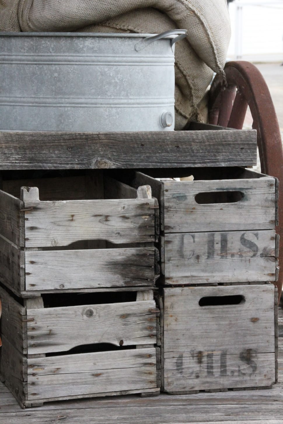 gray metal bucket and brown wooden crates preview