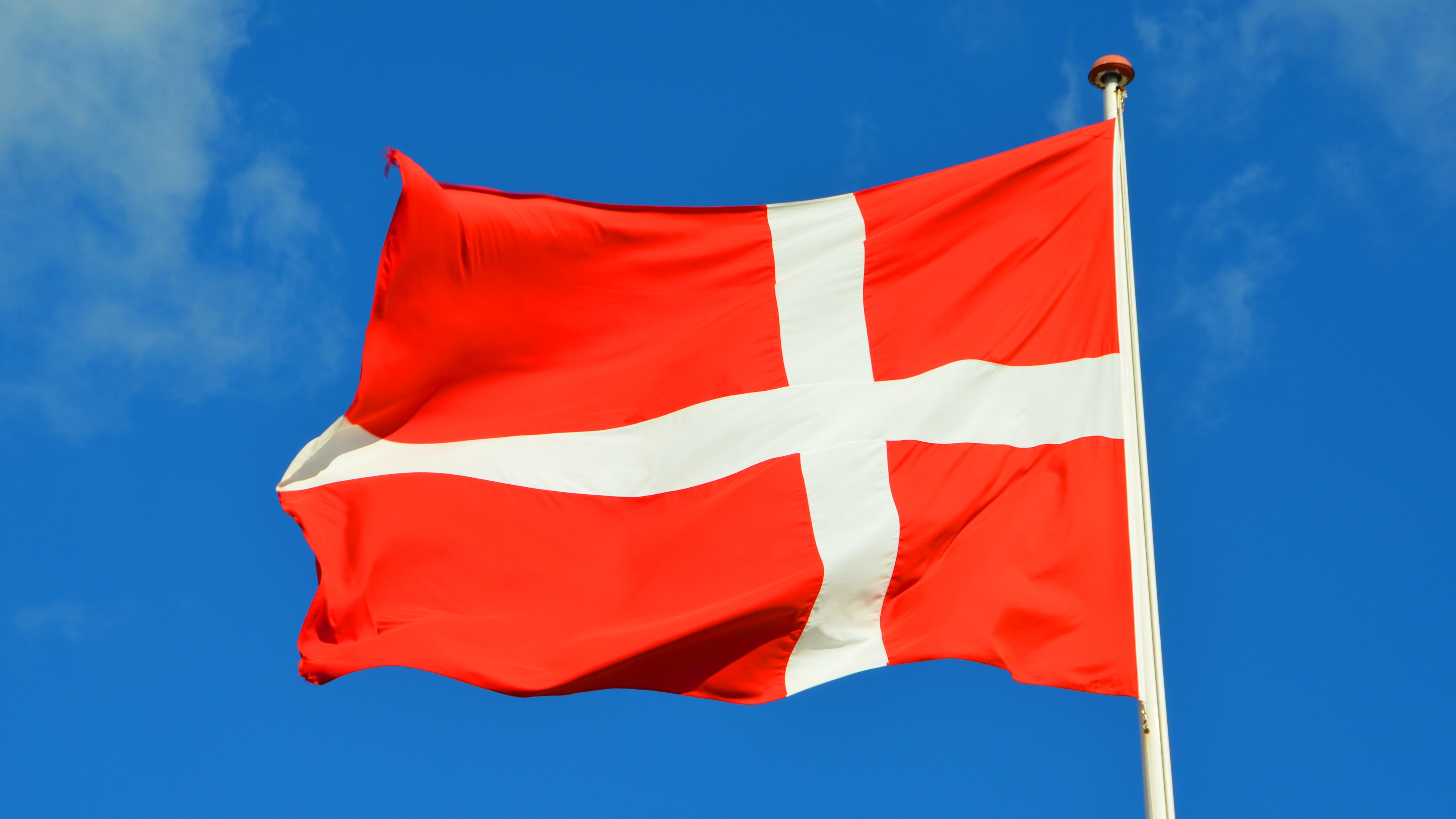 flag with white cross and red background