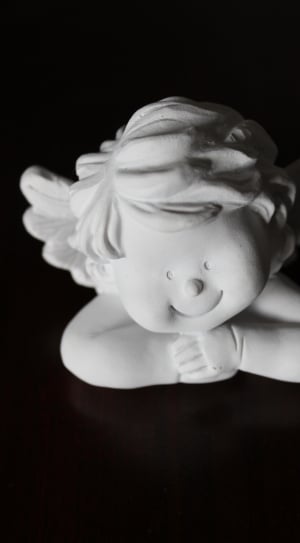 cherub ceramic figurine thumbnail