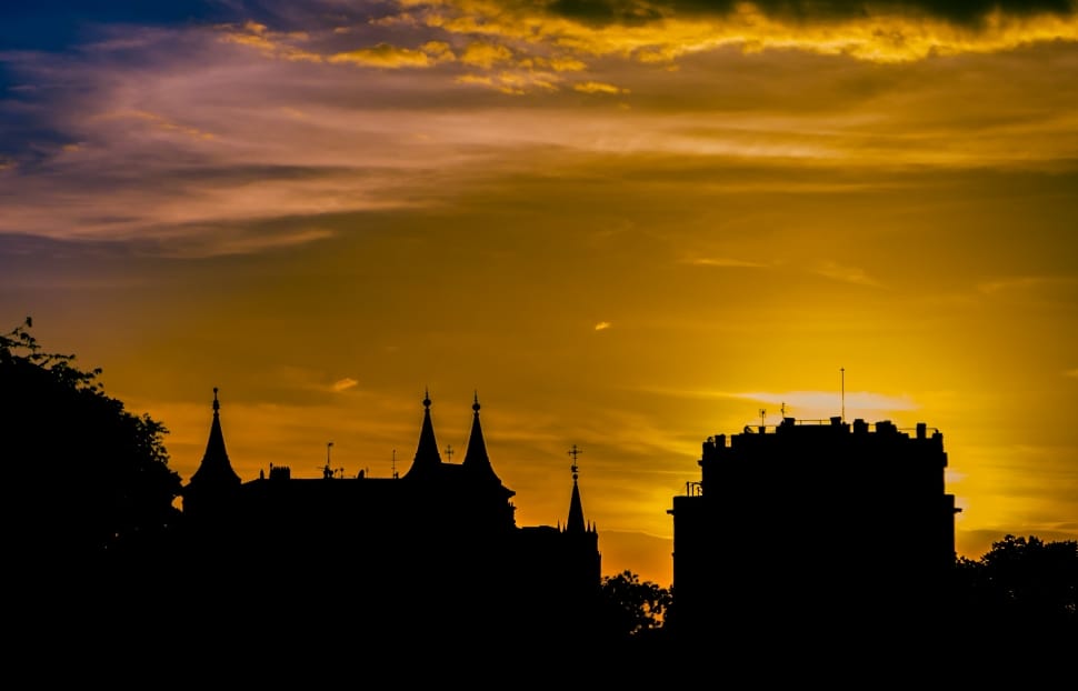 silhouette of buildings during sunset preview