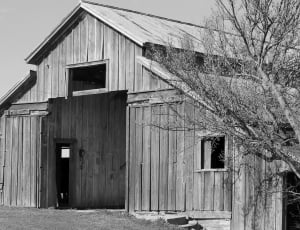gray scale photo of cabin house thumbnail