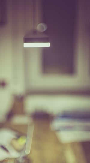 focus photography of lamp inside room thumbnail