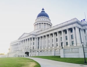 white and blue capitol building during daytime thumbnail