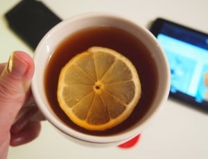 lemon tea and white ceramic mug thumbnail