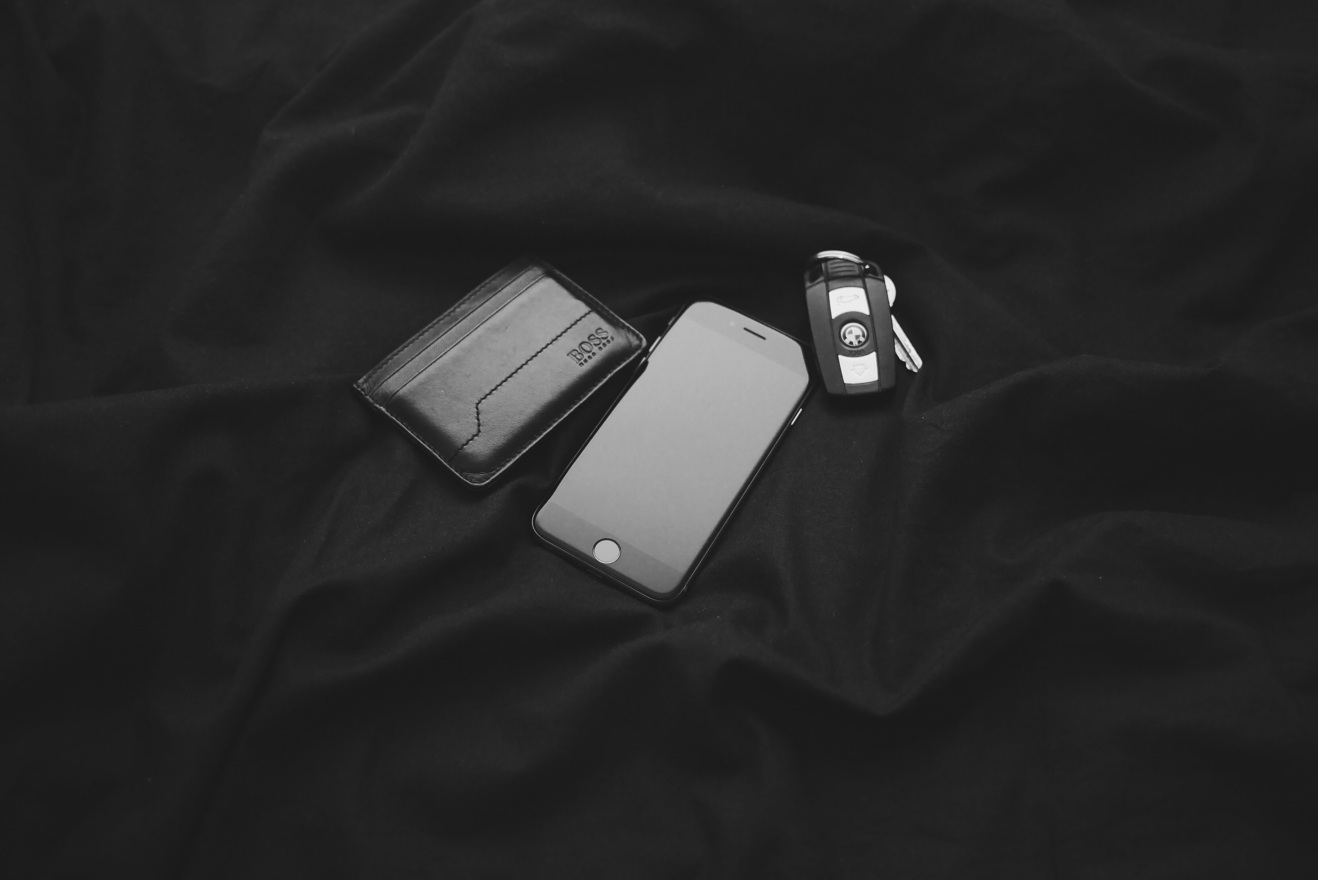 space gray iphone 6 and car fob