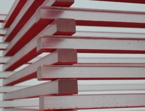 red wooden stacked sticks thumbnail