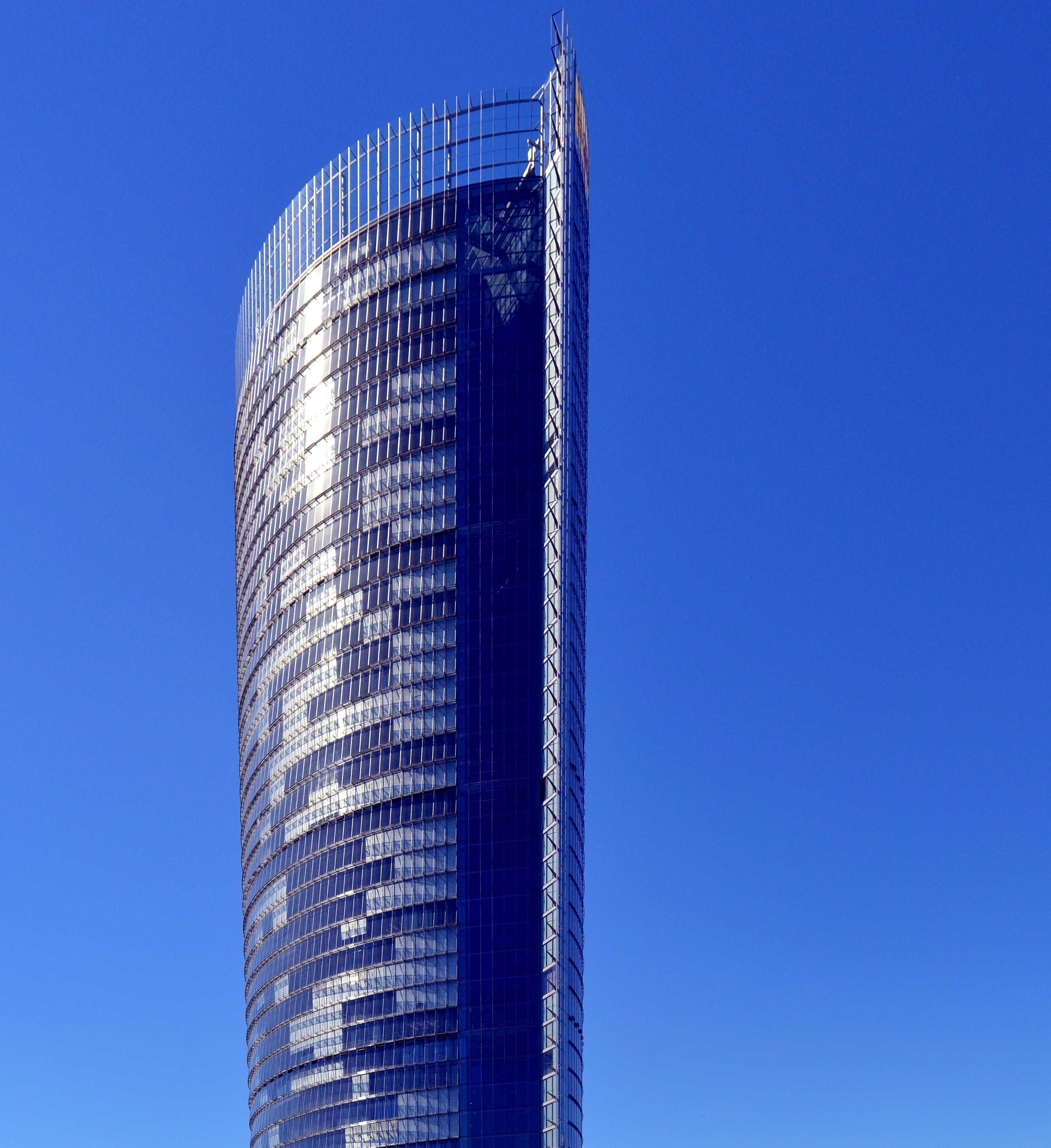 blue curtain glass high rise building