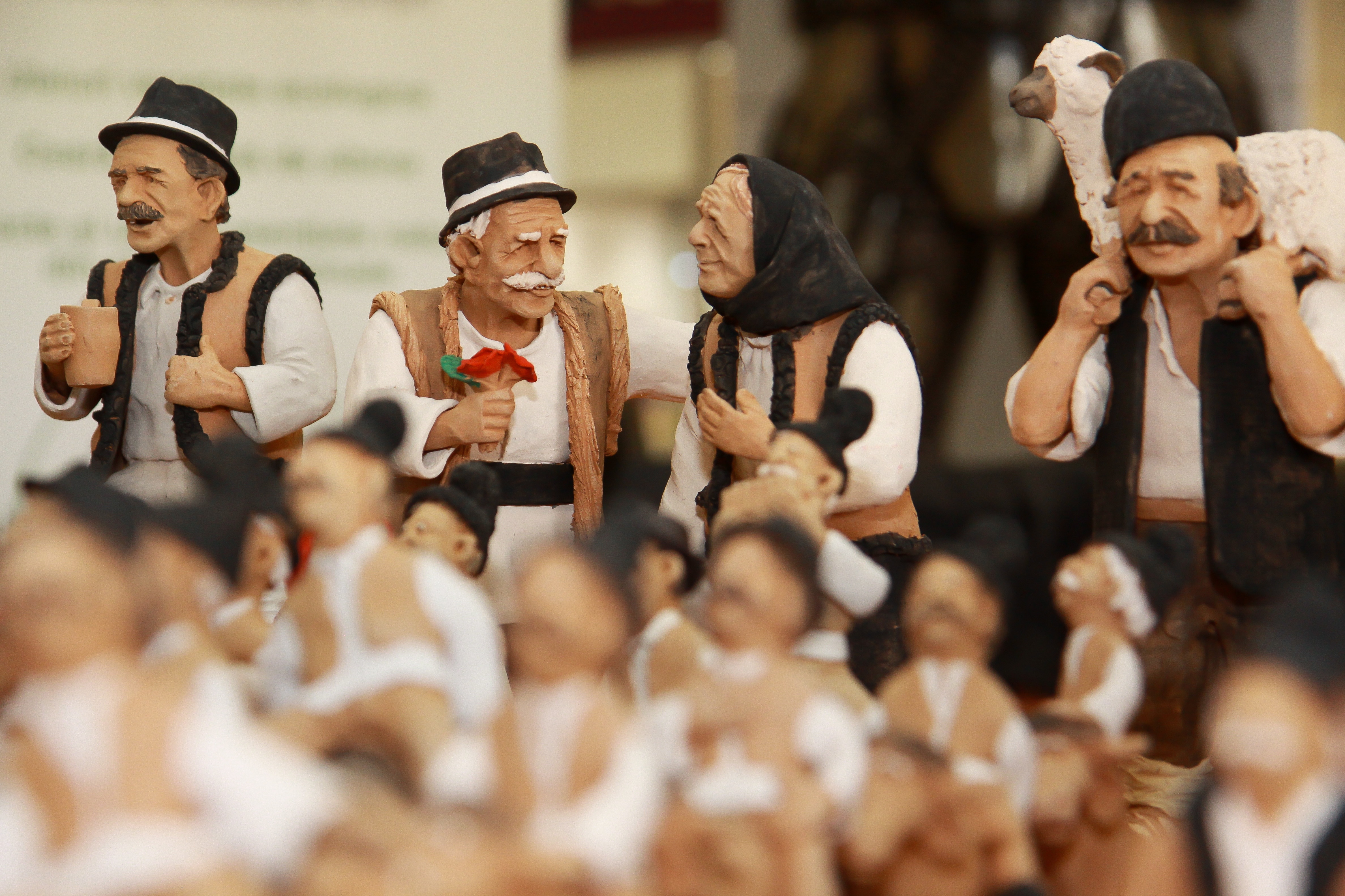 group of men ceramic figurines