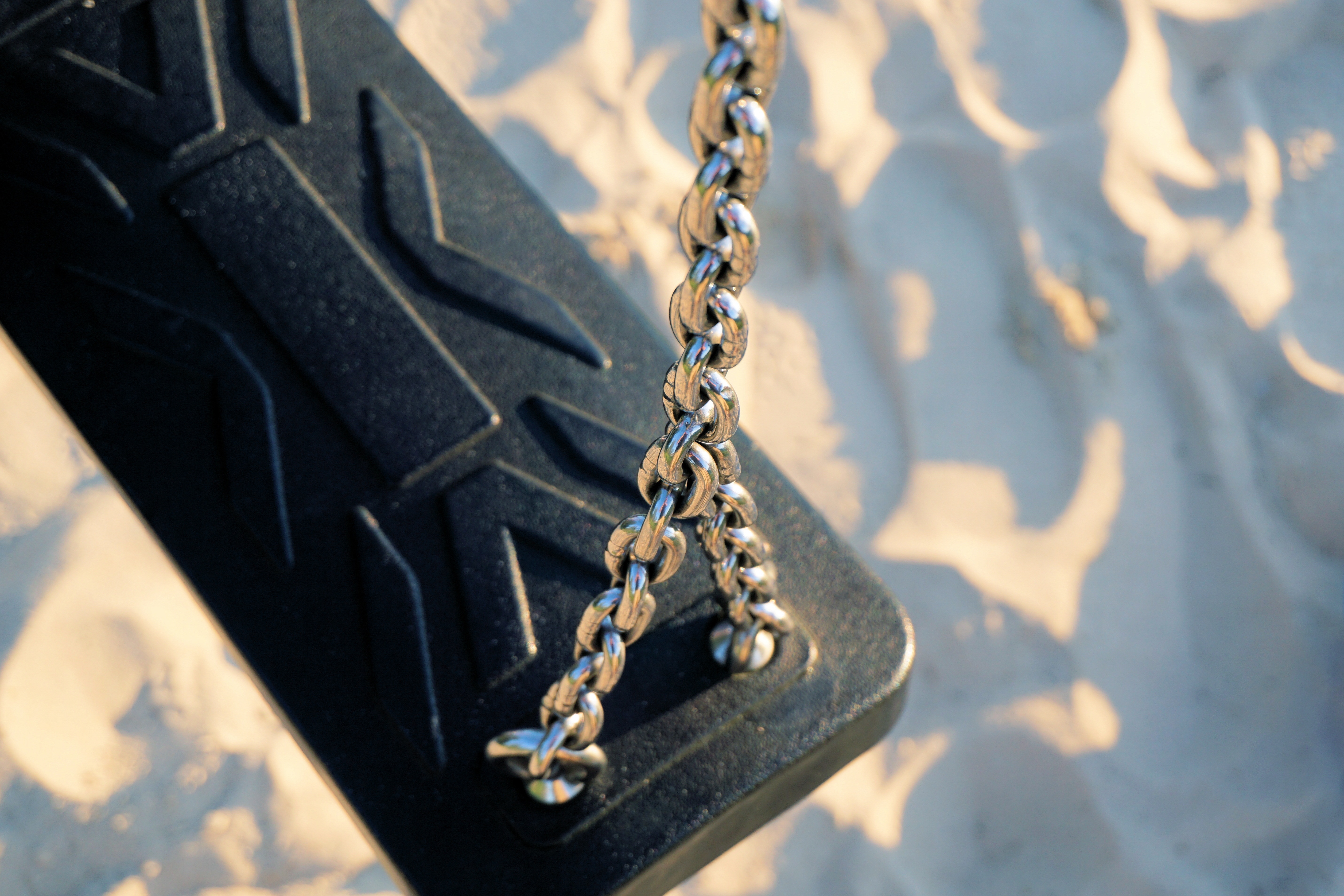 black and steel chain swing