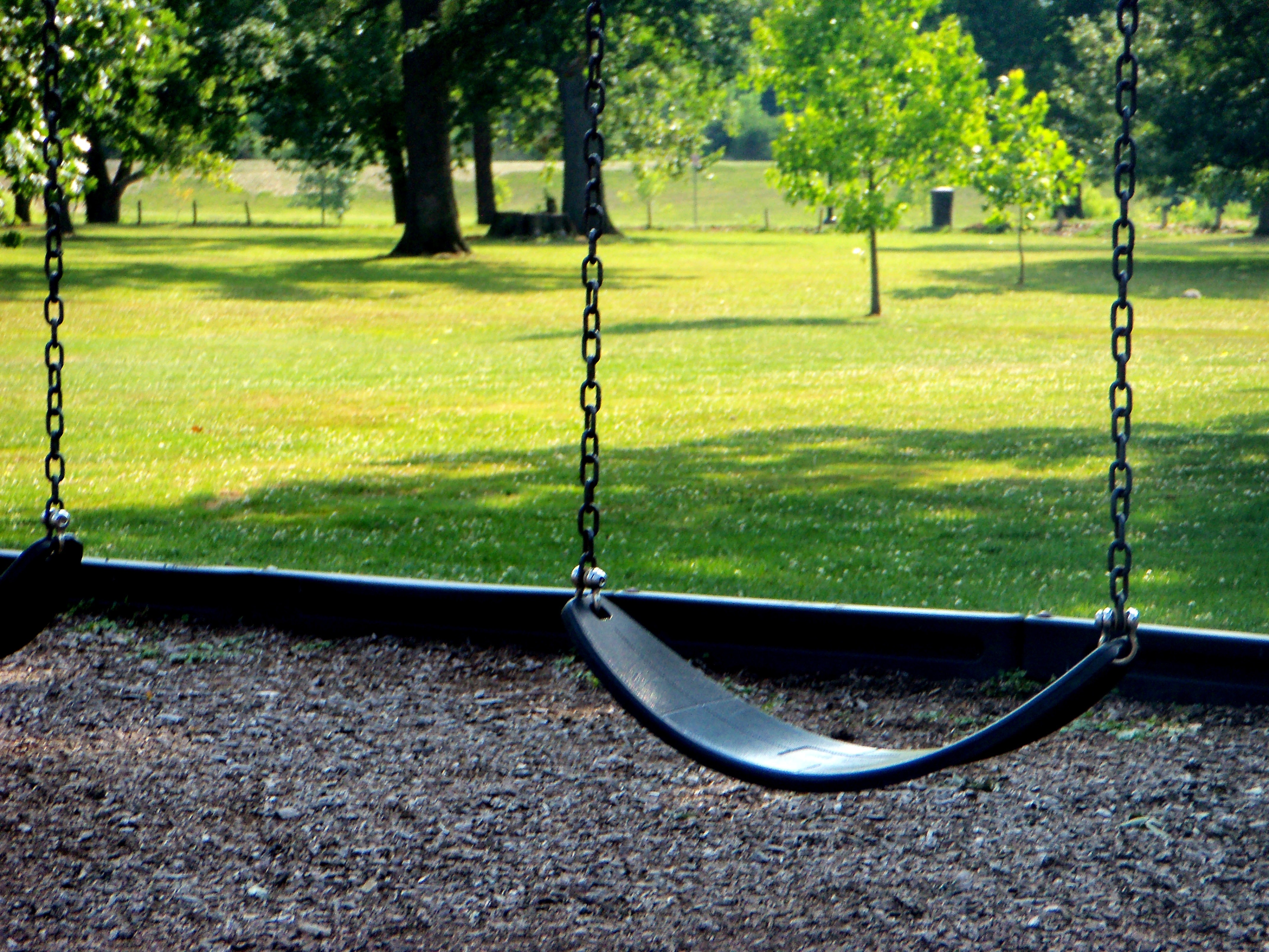 blue swing with no person sitting