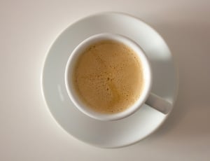white ceramic coffee mug with round saucer thumbnail