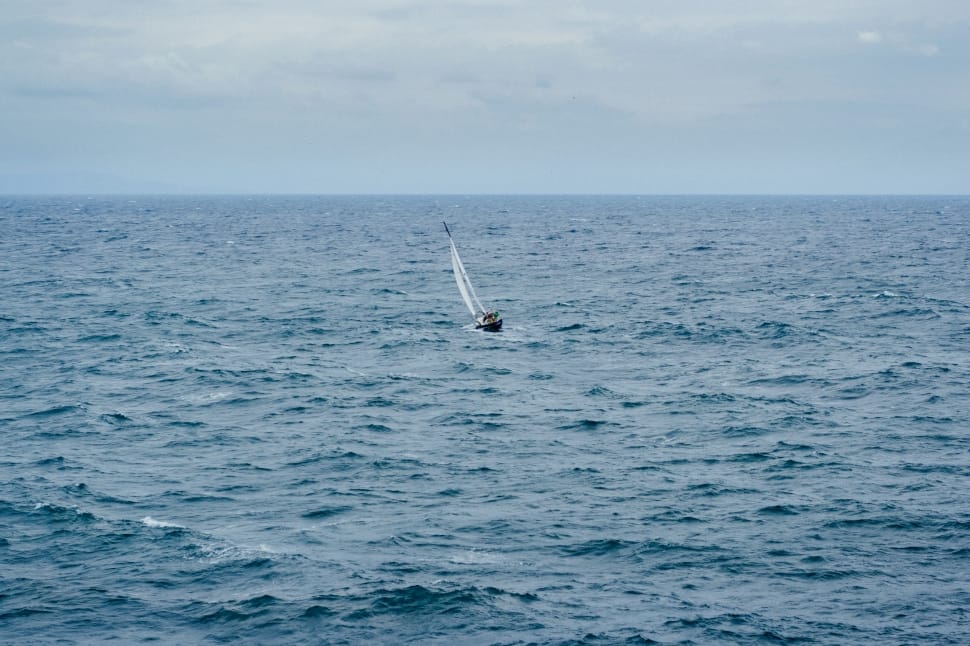 boat sailing in the sea during day time preview