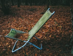 green folding camping chair thumbnail
