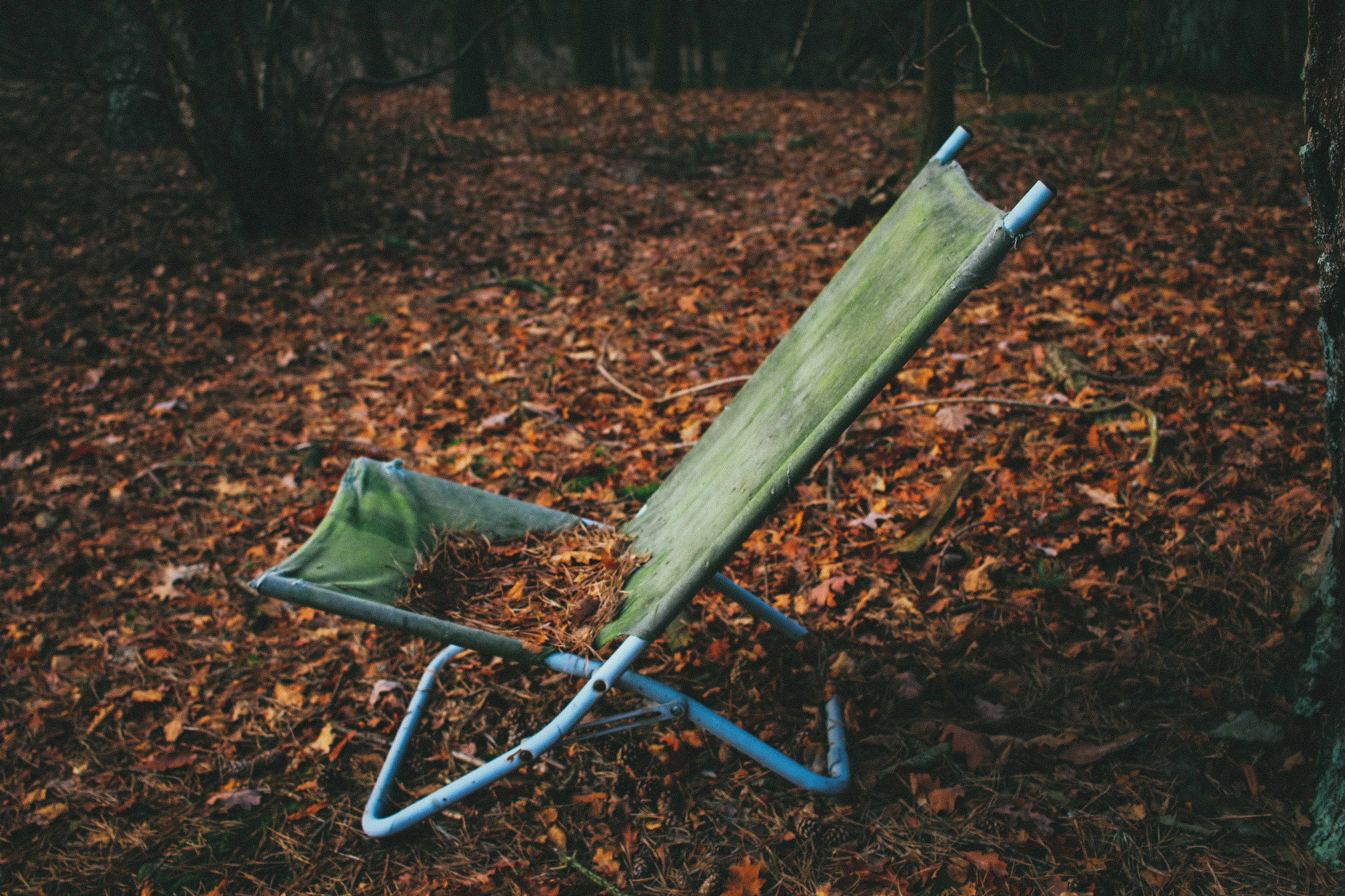 green folding camping chair