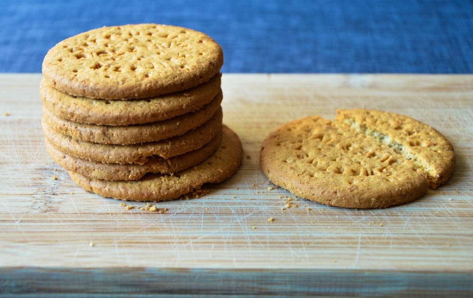 stack of cookies on brown wooden board preview