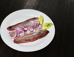 raw fish on ceramic plate thumbnail