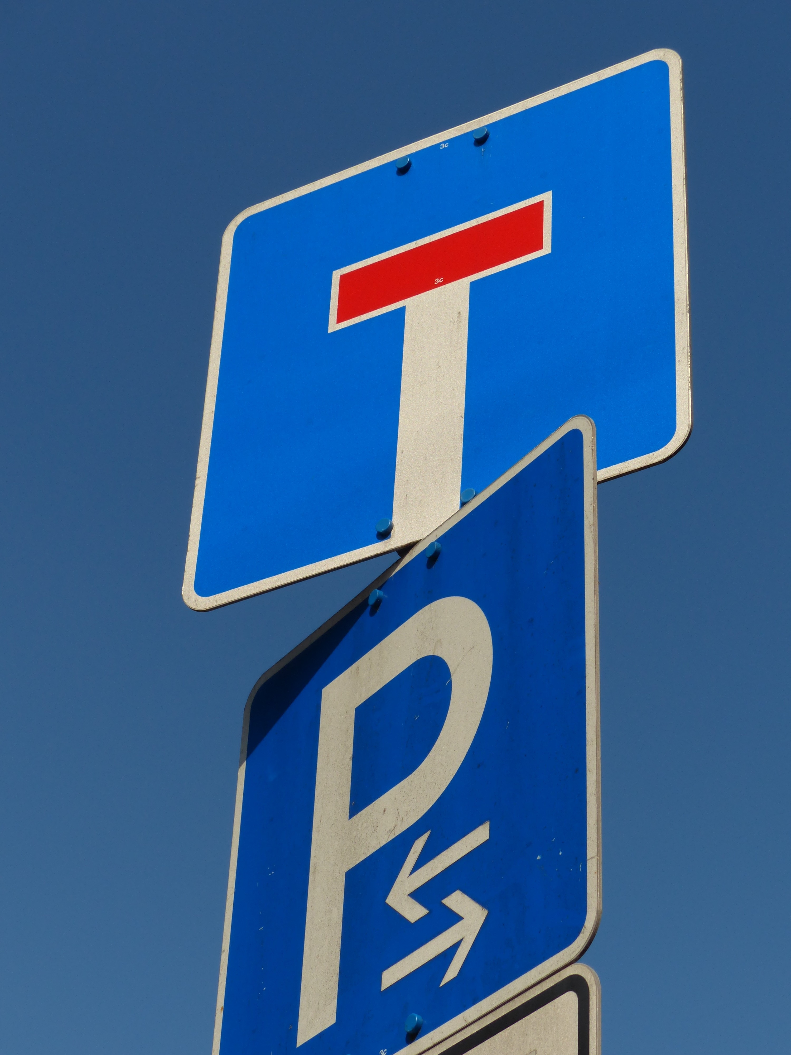 blue and white letter p signage