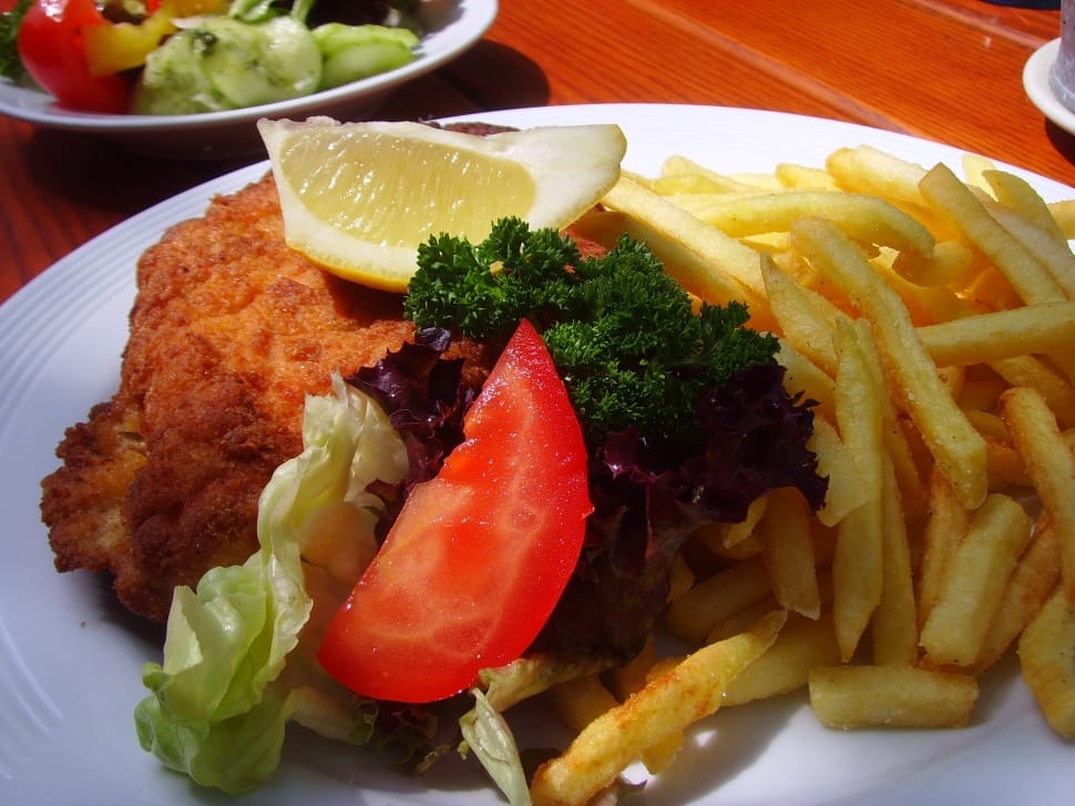 brown dish with fries and vegetable preview