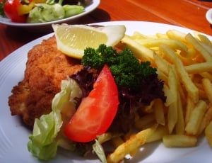 brown dish with fries and vegetable thumbnail