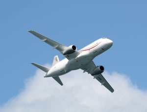 white and red airplane thumbnail