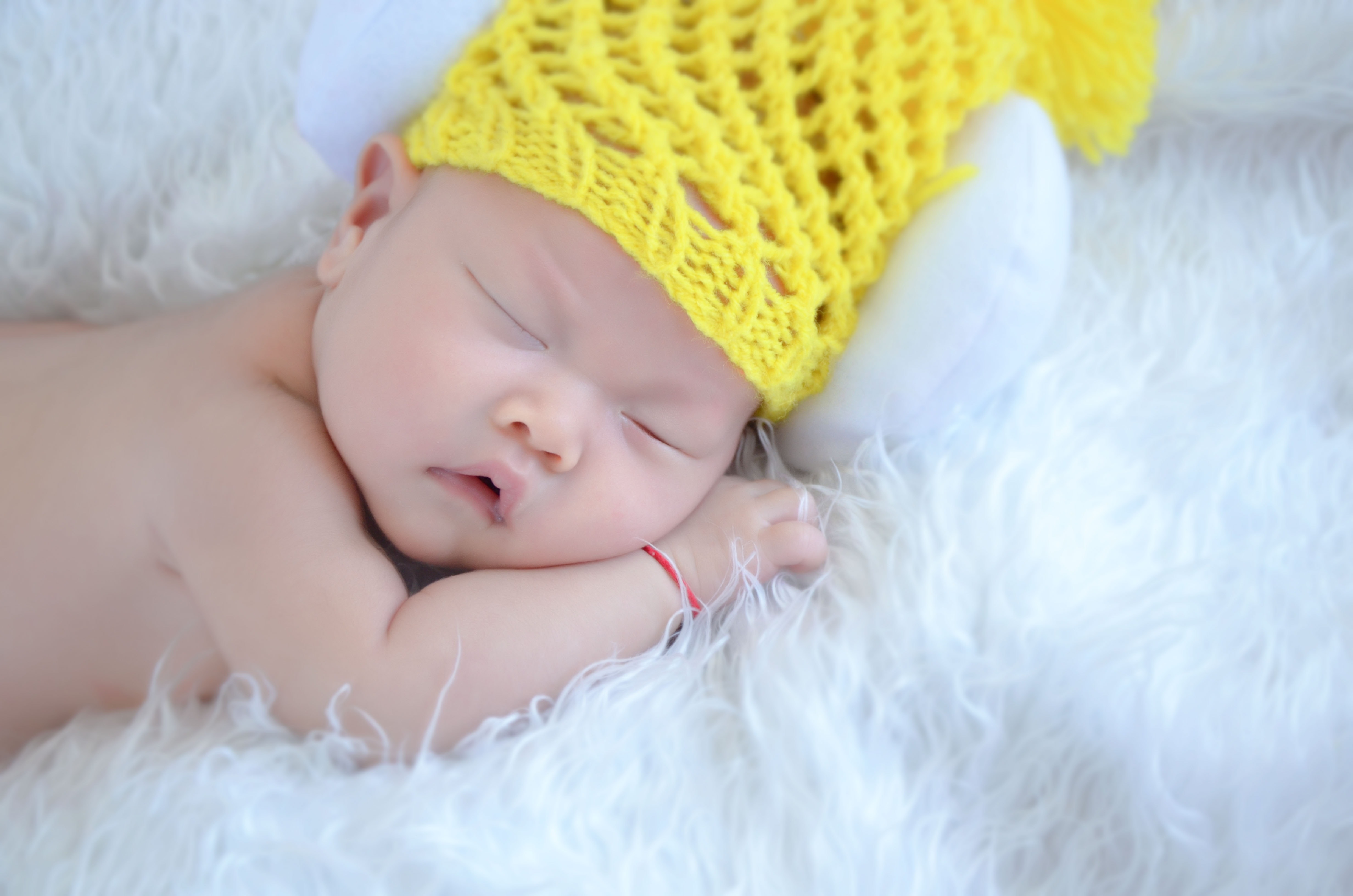 baby's yellow knit cap