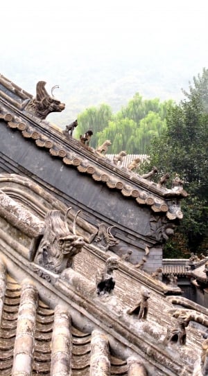 brown animal statue pagoda roof thumbnail