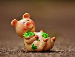 brown pig ceramic figurine thumbnail
