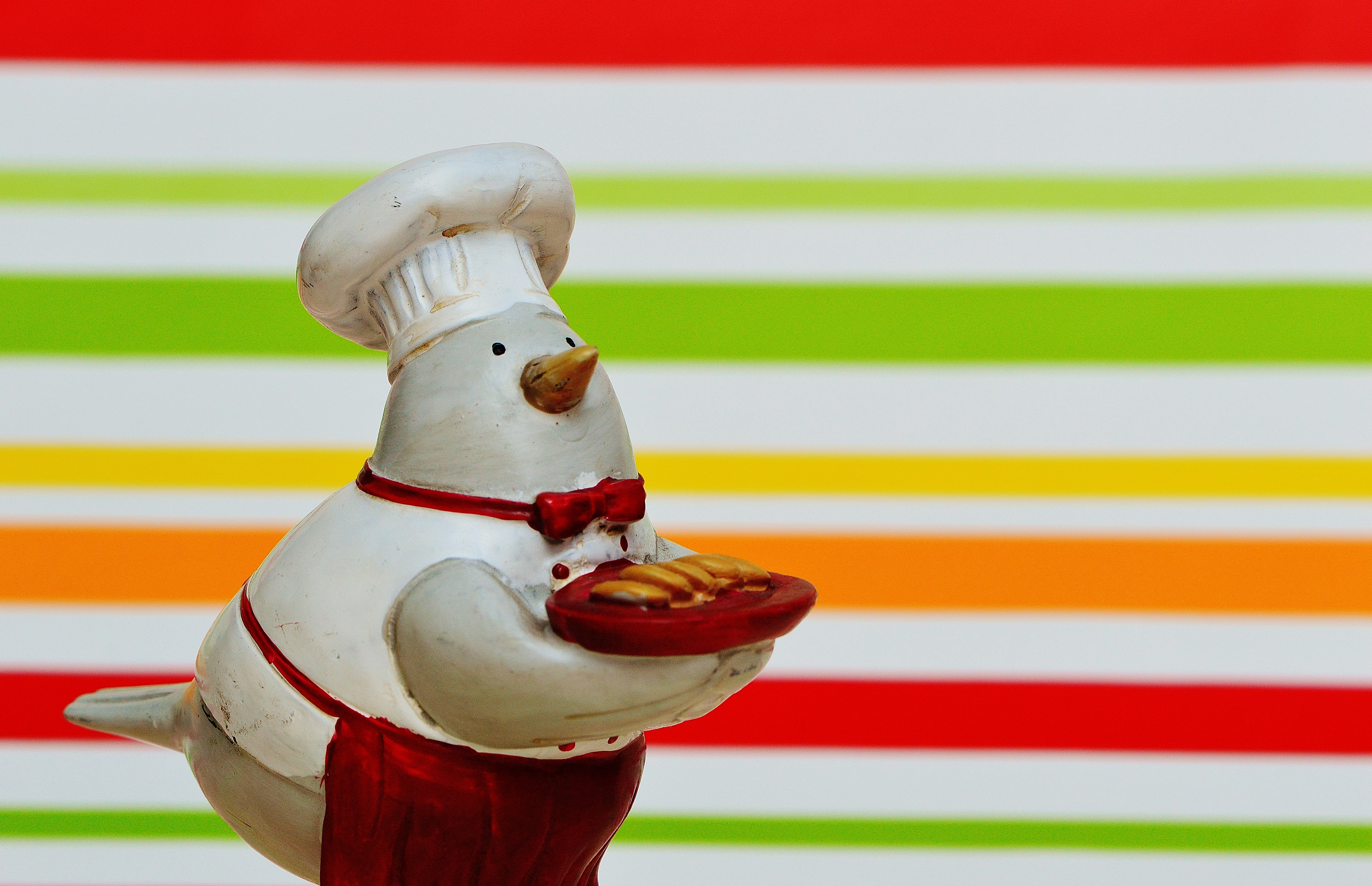 white snowman chef ceramic figurine