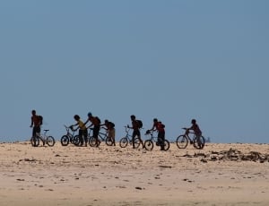 people on bikes in deser thumbnail