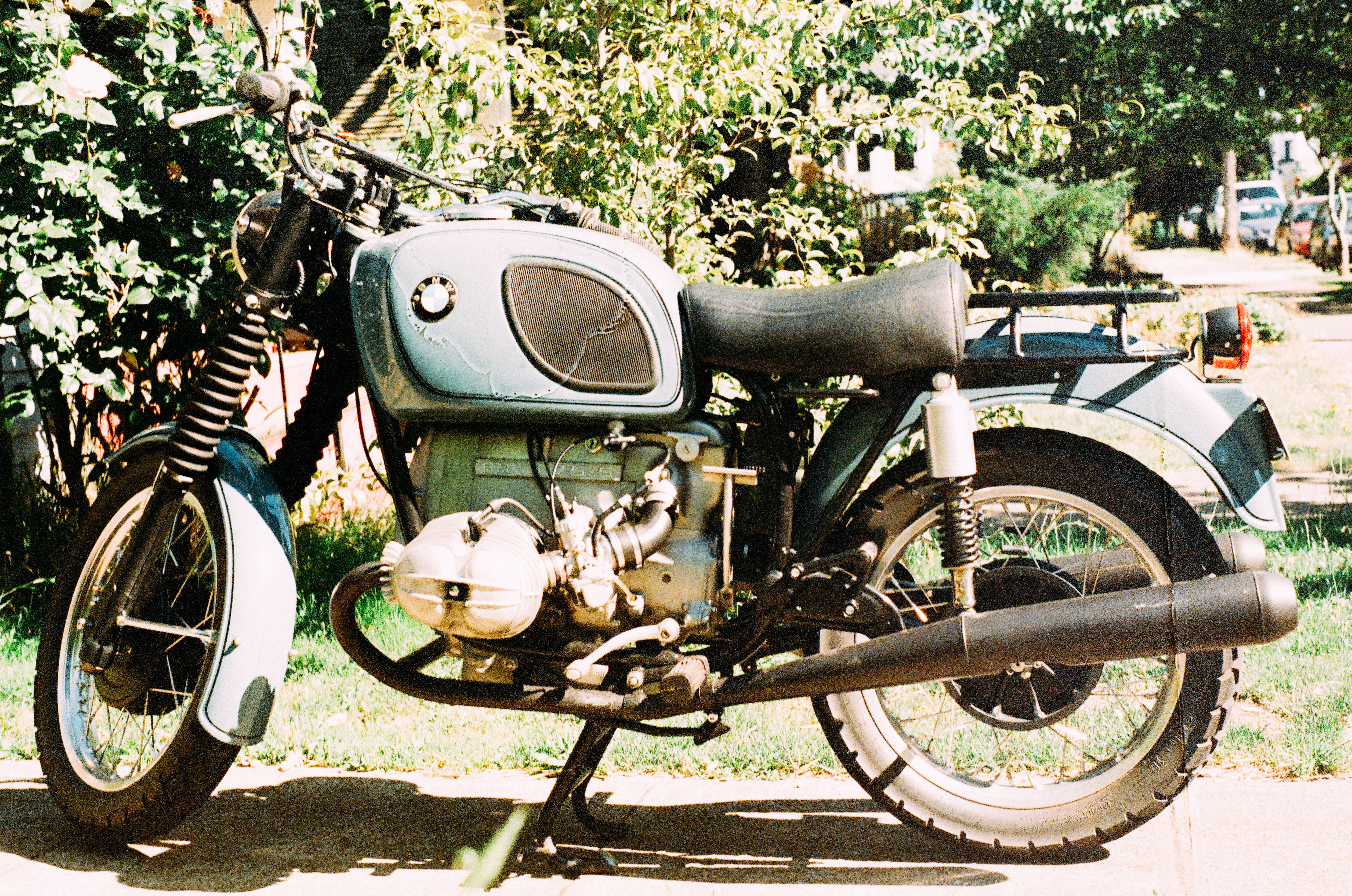 blue and green standard motorcycle