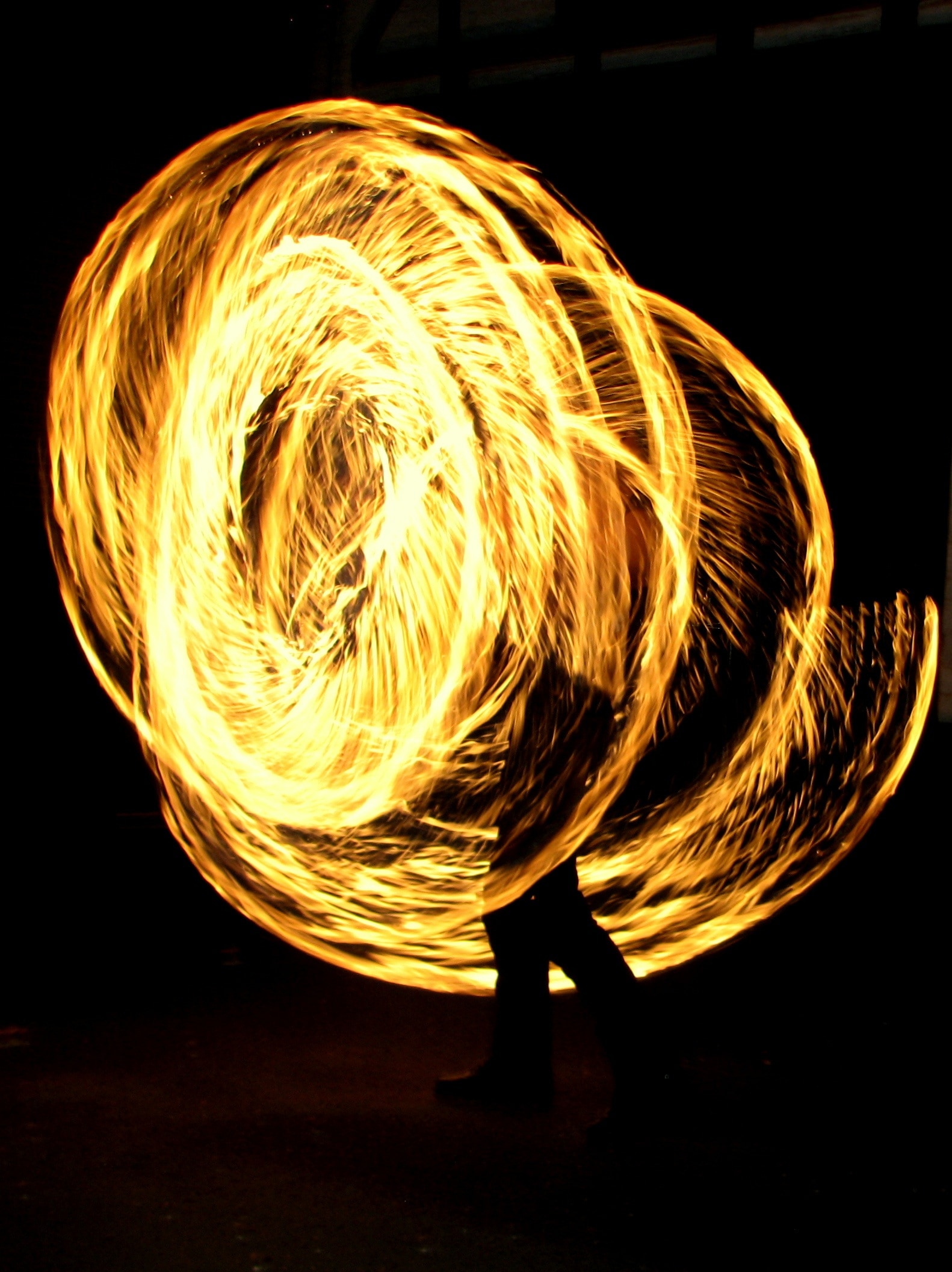timelapse photo of fire dancer