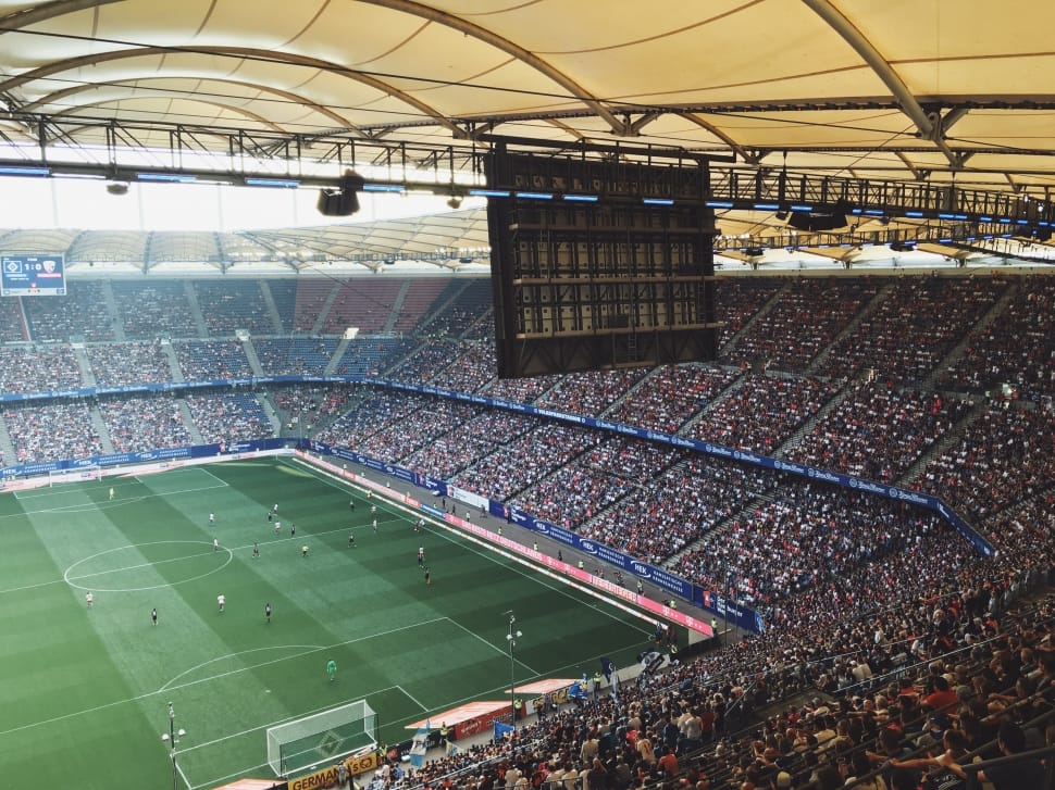 photography of soccer field during daytime preview