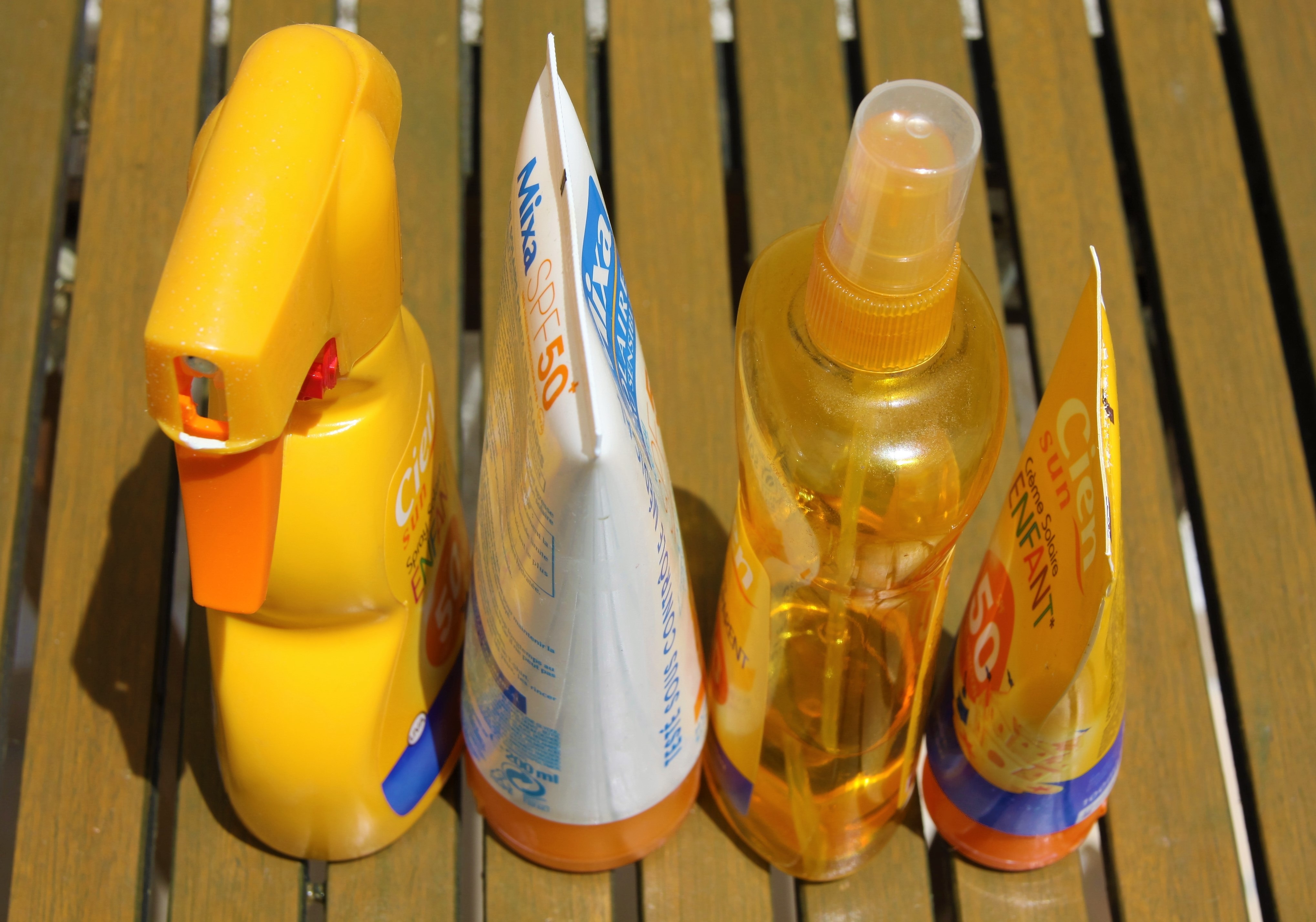 yellow and white labeled bottles