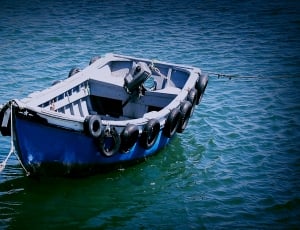 blue and white boat thumbnail
